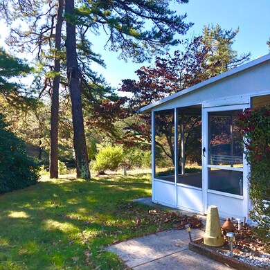 Screen room overlooking pond