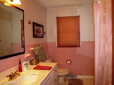 Bath. Hall bath has built in cabinets!