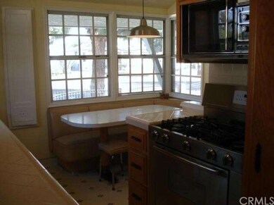 Well lite kitchen, with breakfast table and stainl