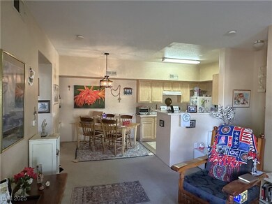 Kitchen featuring pendant lighting, finished concr