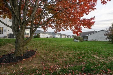 View of grassy yard with a residential view