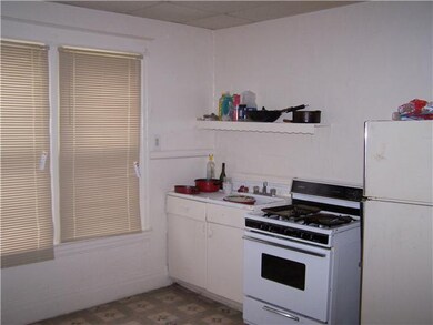 Exterior Front 369 left kitchen