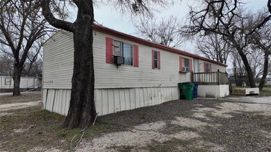 View of side of home with driveway