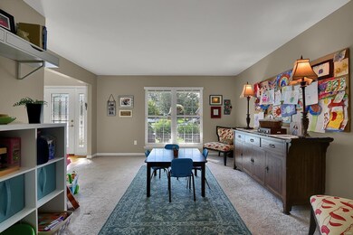 Large family room off main entry, currently used f