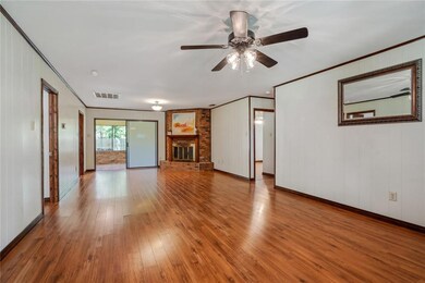 Living Room/Dining with Sunroom in the distance