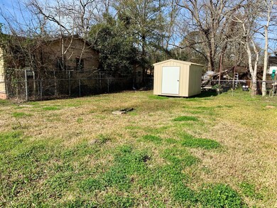 Side Yard with Storage Shed