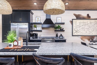 Interior of similar cabin in community. Interior finishes and furnishings will vary from cabin to cabin.