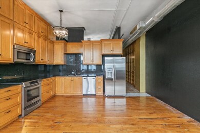 Plenty of storage and built-in desk. Granite count
