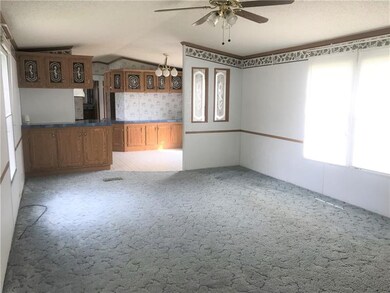 Another view from living room into kitchen/eating 