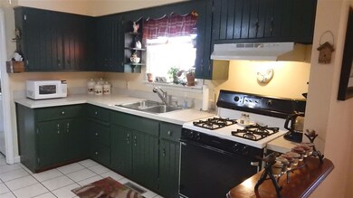 Kitchen Features an Abundance of Cabinet Space and