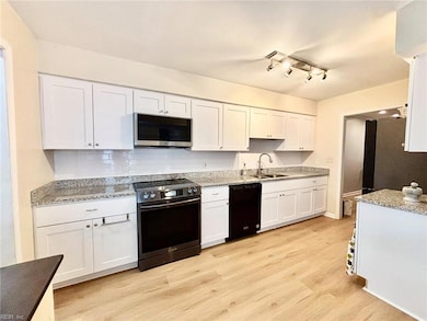 Big kitchen remodeled (2024) to include granite countertops and stainless-steel appliances (2024),