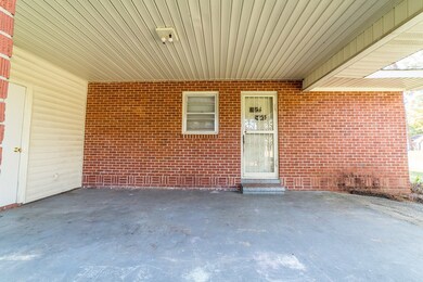 Carport with security door