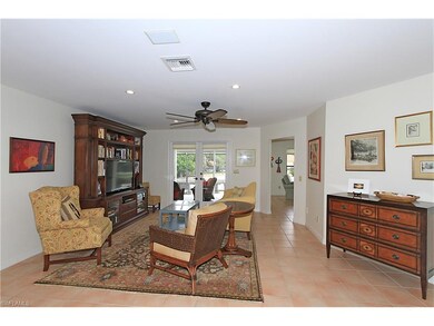 Tile/wood  throughout with French doors to the poo