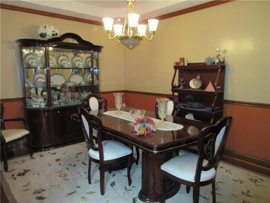 FORMAL DINING ROOM WITH TREY CEILING AND RECESSED 