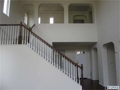 Elegant entry & stairs to 2nd level with Open insi