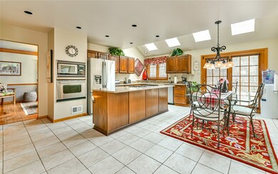 The spacious 20x14 kitchen has plenty light with t