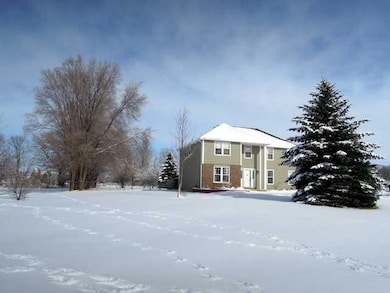 Exterior Front. Lots of privacy on this 1 acre lot