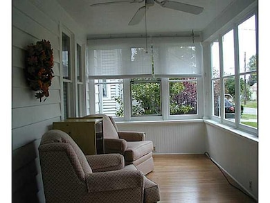 Porch - Enclosed. The enclosed porch has new lamin