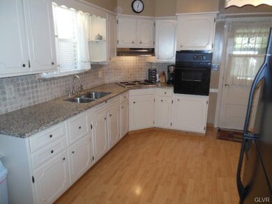 Kitchen with new granite counters and ceramic tile