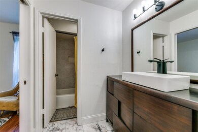 The bathroom has recently been remodeled with mode
