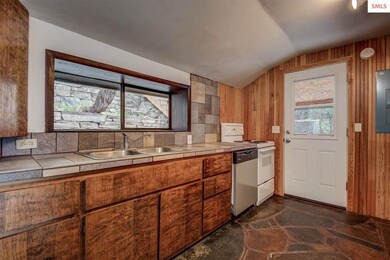 Enjoy the terraced garden view from kitchen sink a