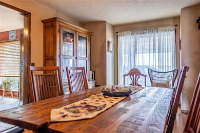 Dining room with a textured ceiling