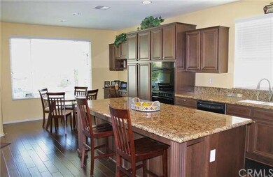 Open Kitchen with Breakfast Nook and Built In Desk