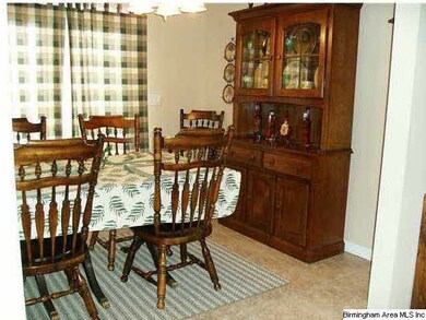DINING AREA HAS FRENCH DOORS THAT LEADS TO OUTSIDE