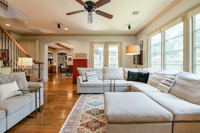 The spacious family room flows seamlessly into the