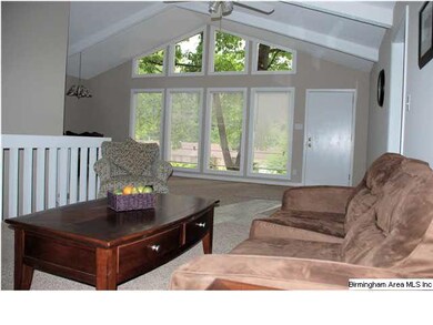 Another view of spacious living room looking towar