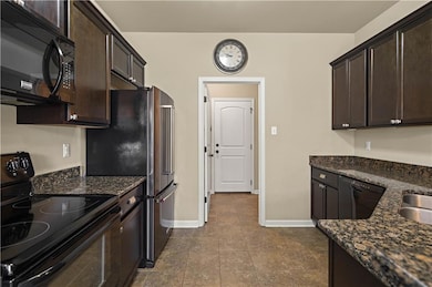 Kitchen to laudry, pantry and attached 2-car garag