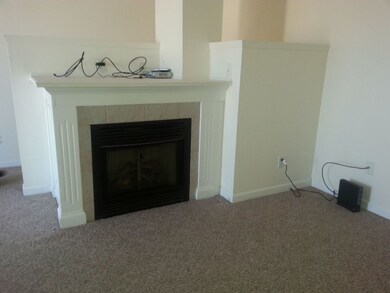 Gas fireplace on upper level, off kitchen