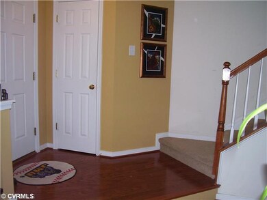 Foyer - Steo Down to Living Area