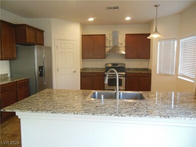 Kitchen featuring visible vents, recessed lighting