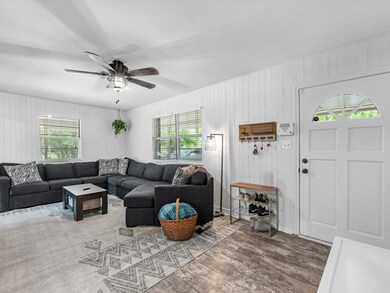 This is a bright and cozy living room featuring a
