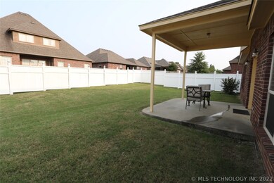 Back yard and back covered patio