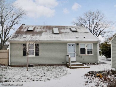 Exterior Back. Large backyard with access from den