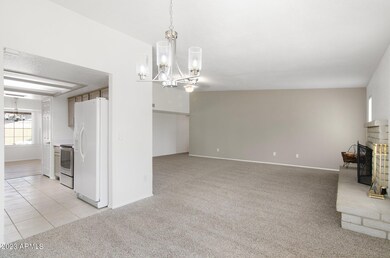 Dining open to kitchen & family room