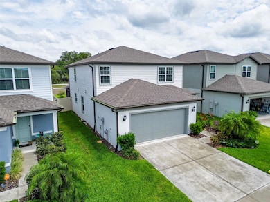 9324 Rally Spring Loop, Wesley Chapel, FL 33545 - photo 2