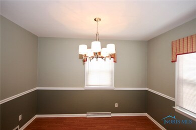  Formal dining room with laminate flooring and new