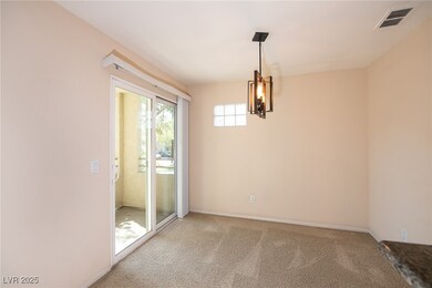 Empty room with an inviting chandelier, baseboards