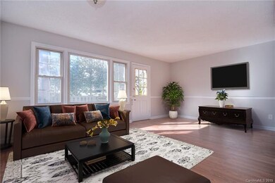 Living room virtually staged for example of furnit