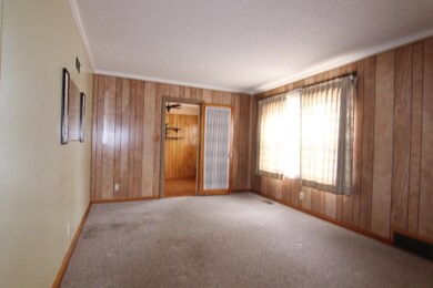 Living Room (Hardwoods under the Carpet)