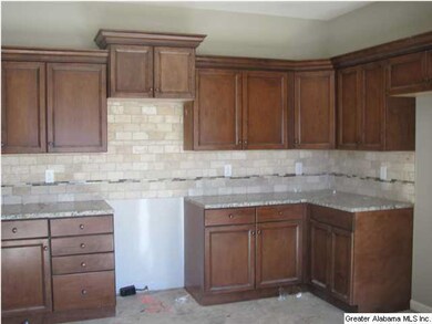 Kitchen w/ tile backsplash
