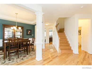 Dining room with columns - open to foyer and invit