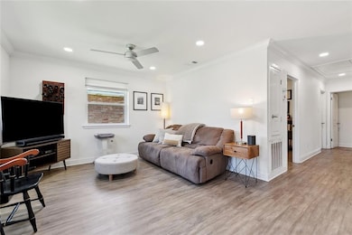 Open living area, can lights & gorgeous flooring