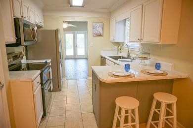 Kitchen featuring appliances with stainless steel 