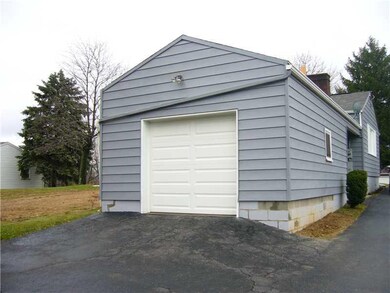 Parking Lot/Garage. Single car garage, new door, a
