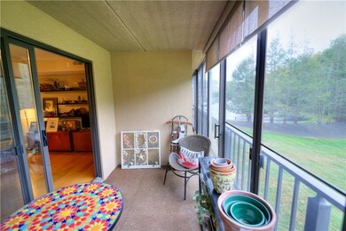 Glass enclosed deck off of the living room