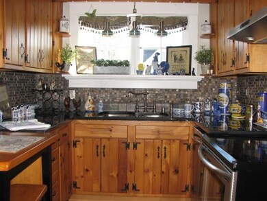 Beautifully refurbished cabinets topped with grani